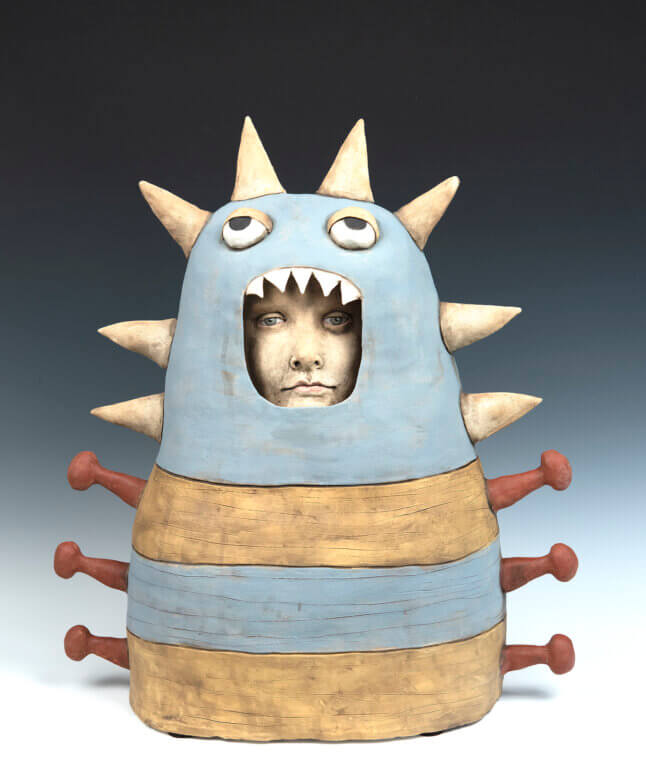 Jeanine Pennell's 'Blue and yellow monster costume (hiding in plain sight)': Stoneware with child's face, playful yet eerie.